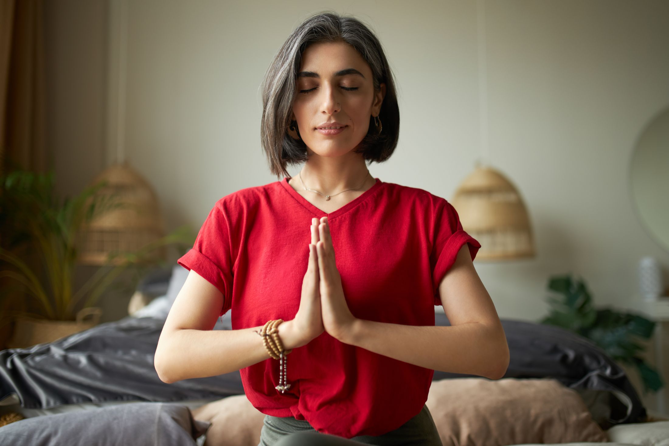 self-awareness-mindfulness-concept-young-woman-having-premature-graying-meditating-home-with-eyes-closed.jpg